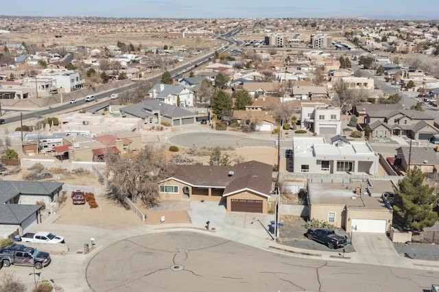 birds eye view of property with a residential view