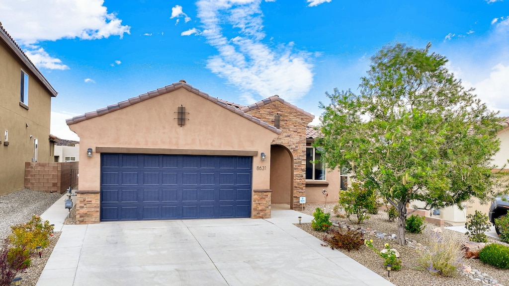 view of front of property with a garage