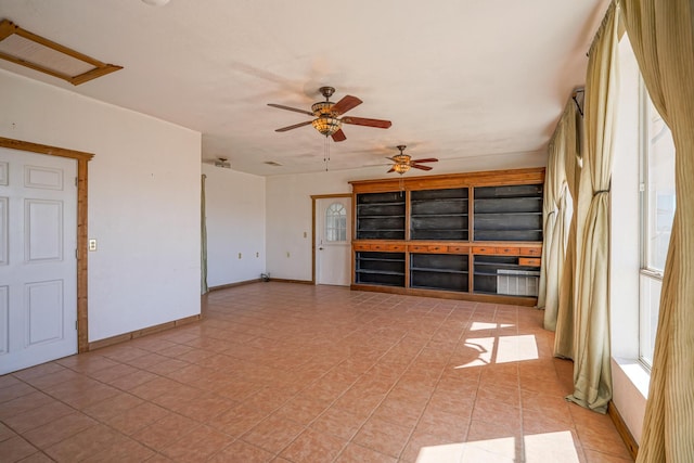 unfurnished room featuring ceiling fan