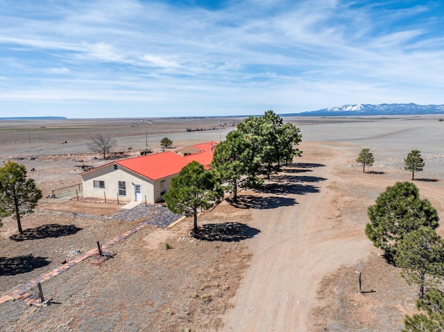 aerial view featuring a mountain view and a rural view