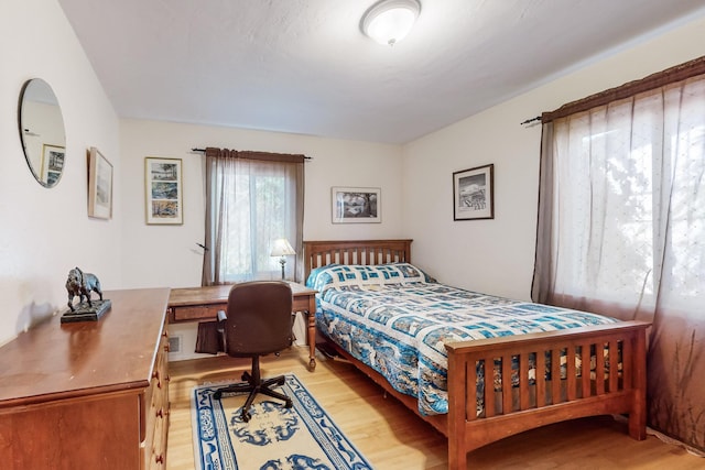 bedroom featuring light wood-type flooring