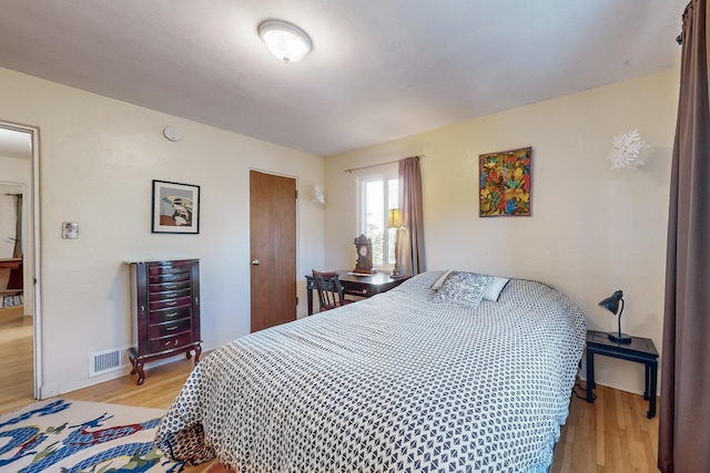 bedroom featuring light wood-type flooring