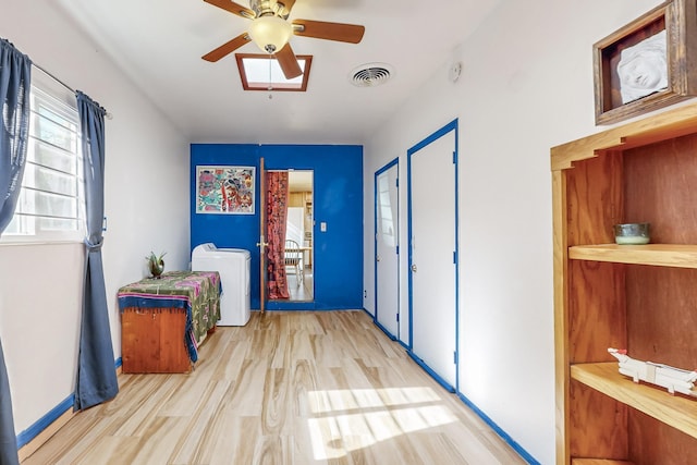 bedroom with ceiling fan and light hardwood / wood-style flooring