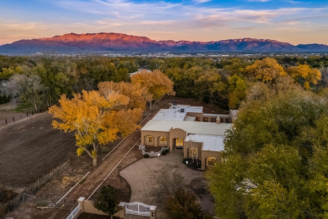 aerial view at dusk with a mountain view