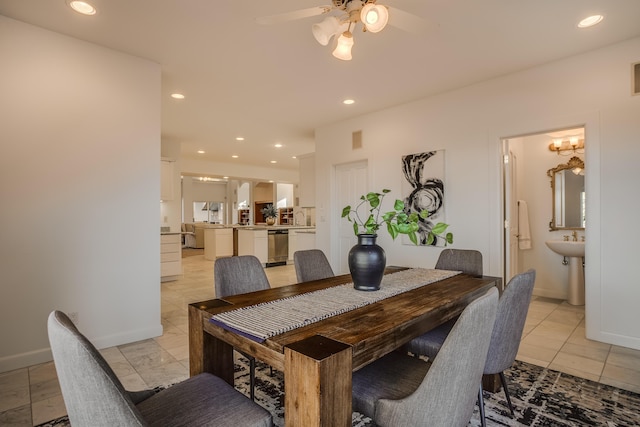 dining room featuring ceiling fan