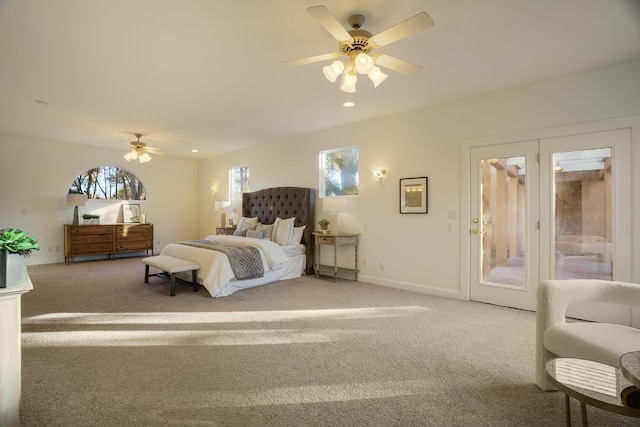 carpeted bedroom with ceiling fan and access to exterior