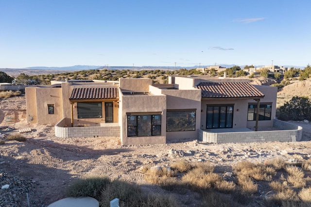 rear view of house with a patio area