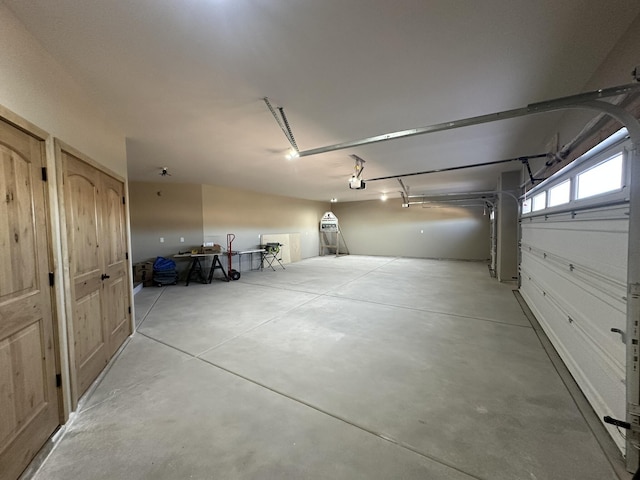 garage featuring a garage door opener