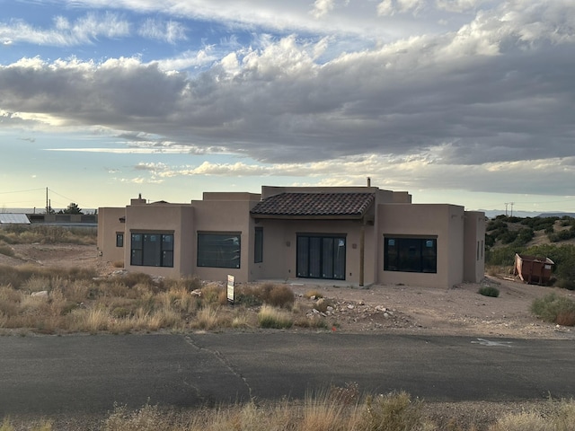 view of pueblo revival-style home