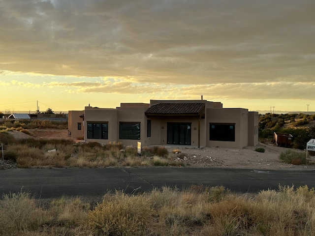 view of pueblo revival-style home