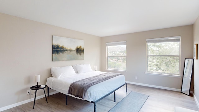 bedroom featuring light hardwood / wood-style floors