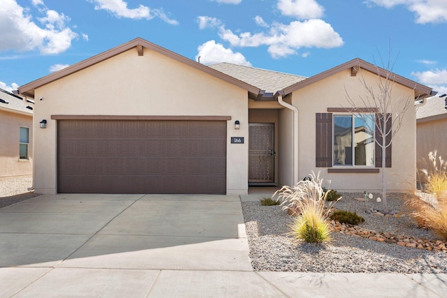 ranch-style home featuring a garage