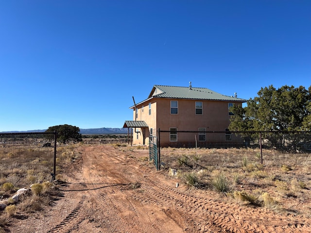 view of side of property featuring a mountain view