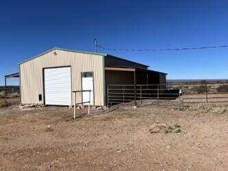 view of outbuilding featuring a garage