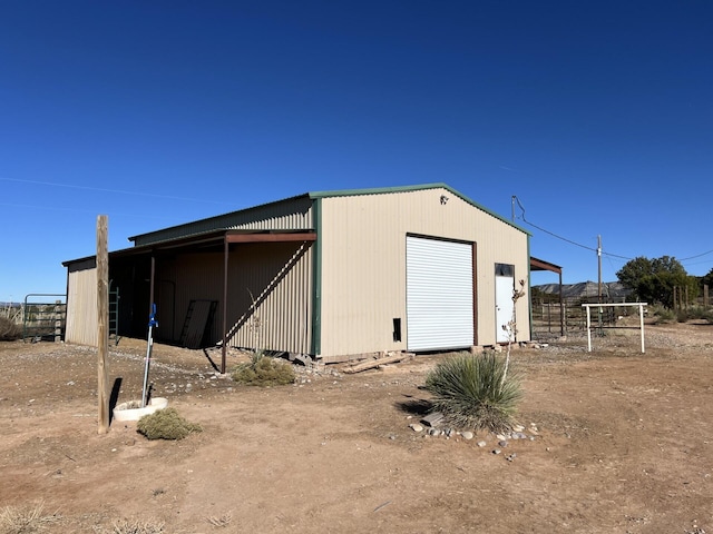 view of outbuilding featuring a garage