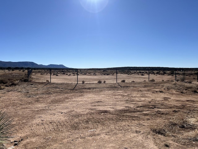 view of mountain feature with a rural view