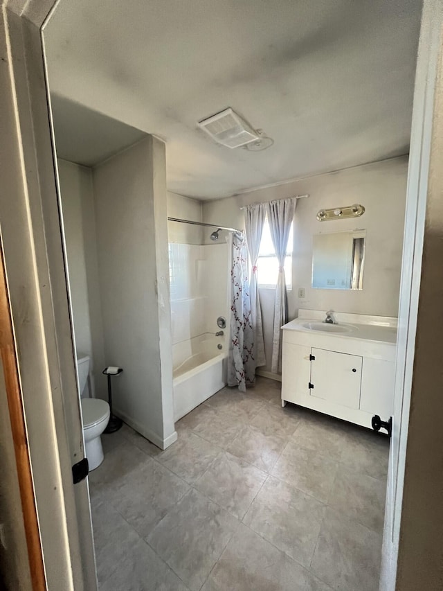 full bathroom with vanity, toilet, and shower / bath combo