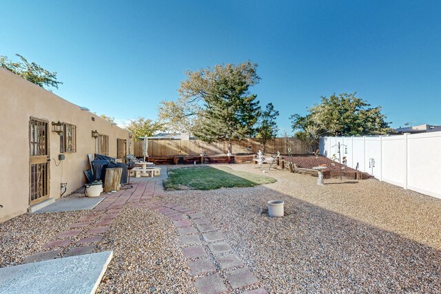 view of yard featuring a patio