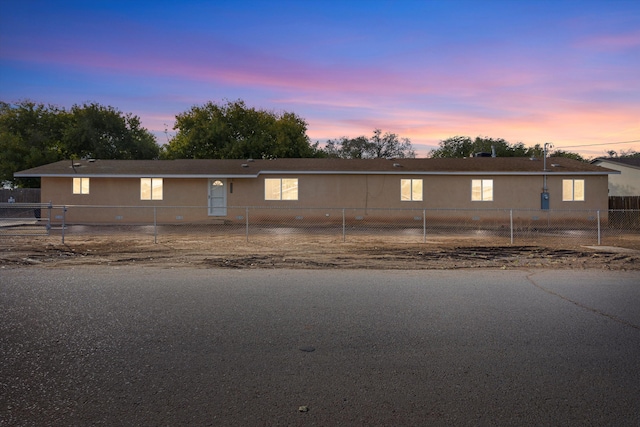 view of property exterior at dusk