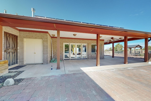 view of patio / terrace featuring ceiling fan