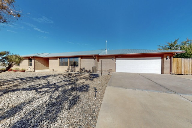 single story home with a garage