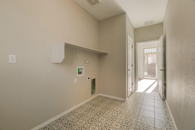 laundry room with washer hookup, light tile patterned floors, hookup for a gas dryer, and electric dryer hookup