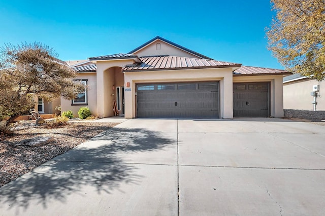 view of front of home with a garage