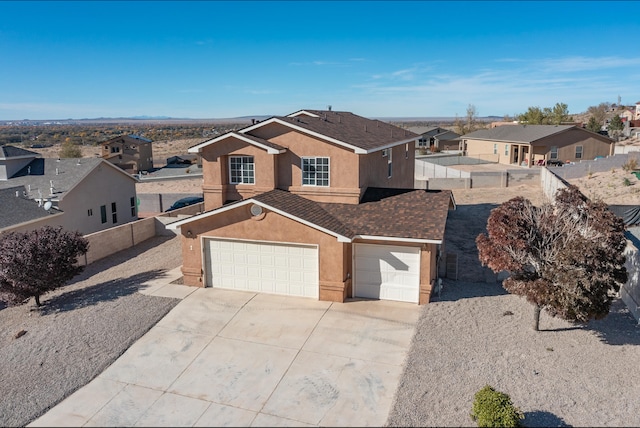 view of front of house with a garage