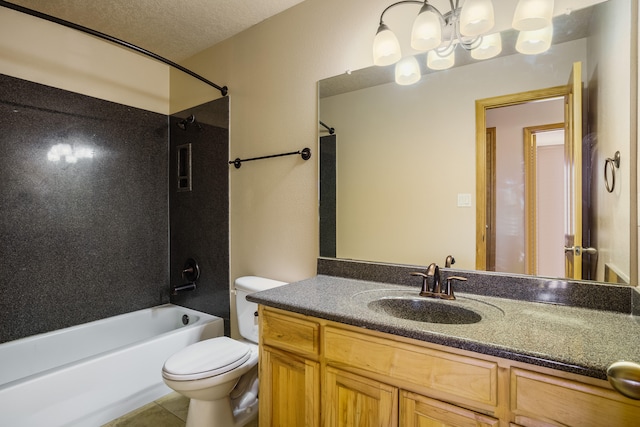 full bathroom featuring tile patterned floors, vanity, a textured ceiling, shower / bathing tub combination, and toilet