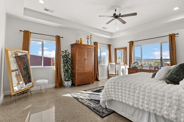 bedroom featuring ceiling fan and access to exterior