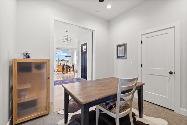 dining room with a chandelier