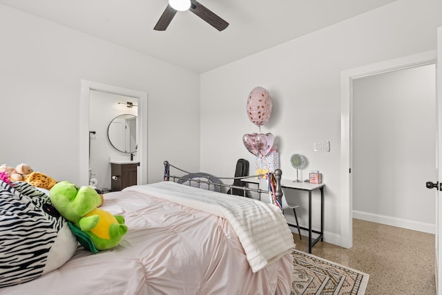 bedroom with ensuite bathroom and ceiling fan