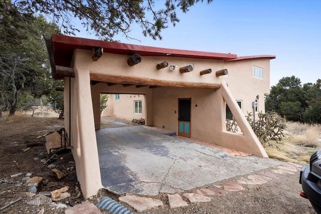 exterior space with a patio