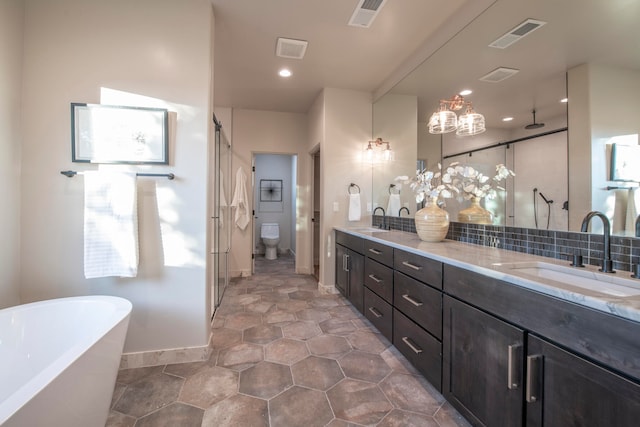 full bathroom with vanity, independent shower and bath, and toilet