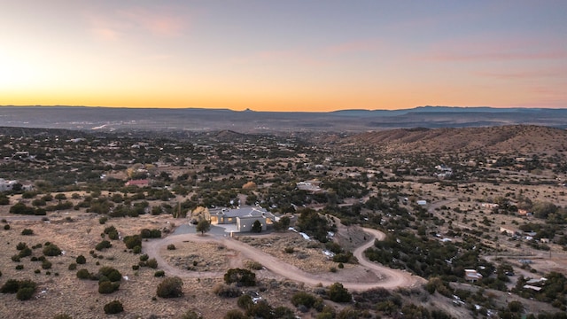 aerial view at dusk with a mountain view