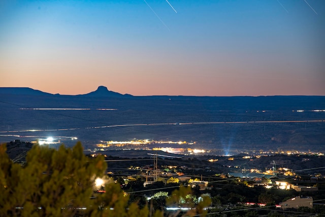 property view of mountains featuring a water view