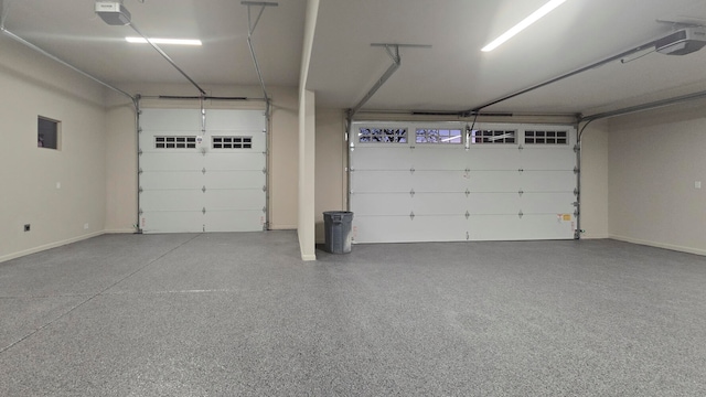 garage featuring a garage door opener