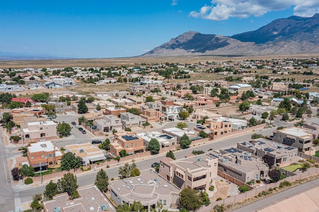 drone / aerial view featuring a mountain view