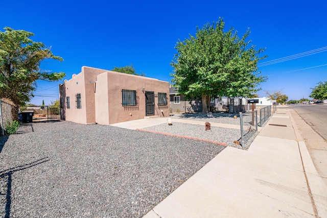 view of adobe home