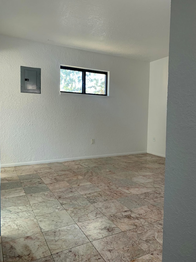 empty room featuring electric panel