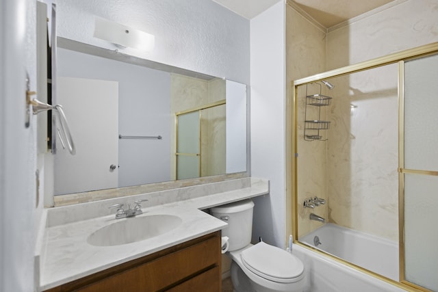 full bathroom featuring toilet, bath / shower combo with glass door, and vanity