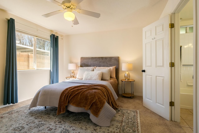 bedroom featuring a ceiling fan and light carpet