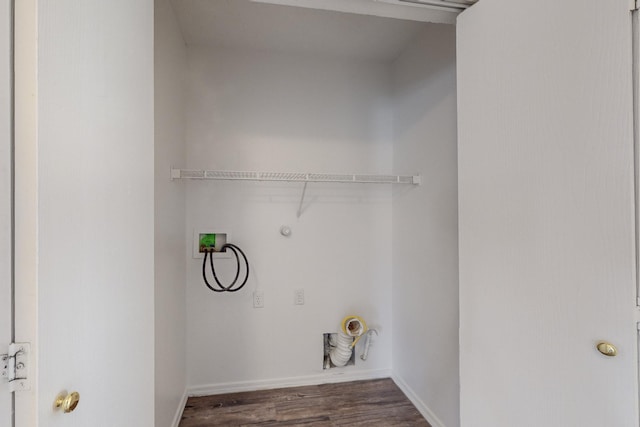 laundry room featuring hookup for a gas dryer, dark wood-type flooring, and washer hookup