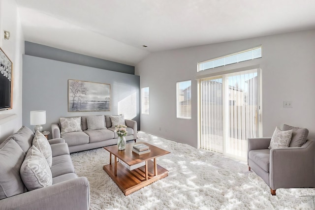 living room with vaulted ceiling