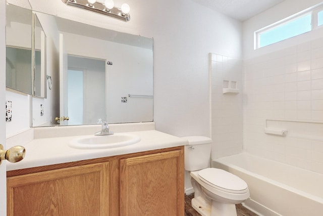 full bathroom with vanity, toilet, wood-type flooring, and shower / washtub combination