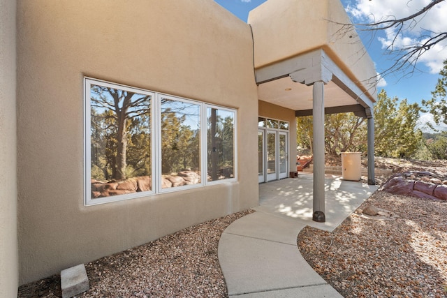 view of patio featuring french doors