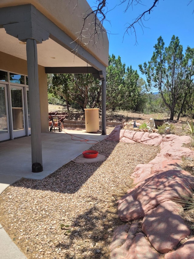 view of yard with a patio area