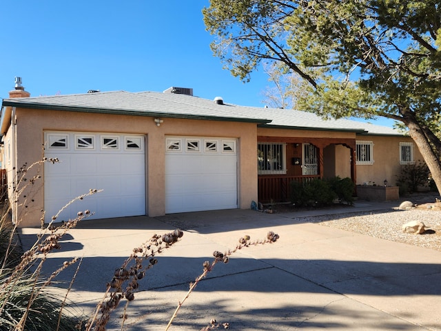 ranch-style home with a garage