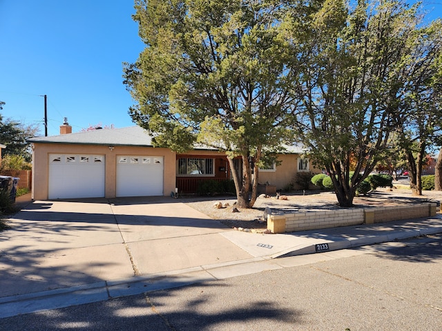 ranch-style house with a garage