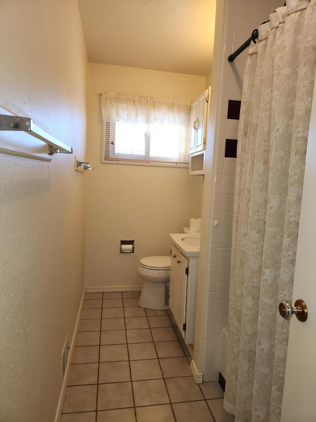 full bathroom featuring tile patterned flooring, vanity, toilet, and shower / tub combo